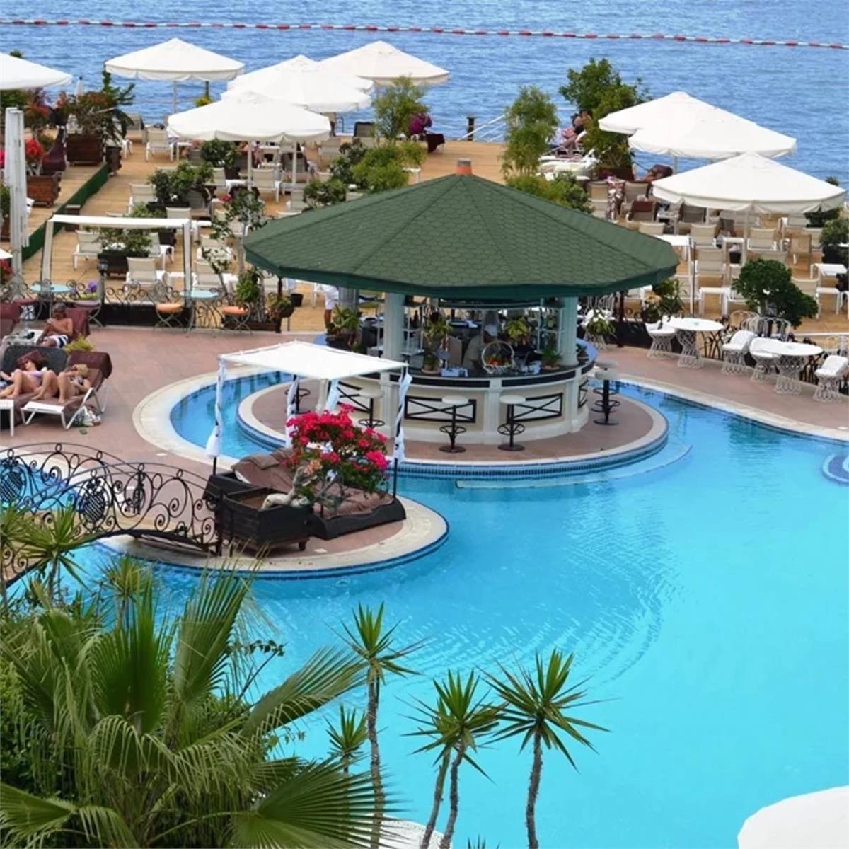 İzmir'den Uçak Bileti ve Otel Transferi Dahil 2 Gece 3 Gün Yarım Pansiyon Konaklamalı Rocks Hotel Casino İrem Derici Yılbaşı Galası 35.150TL'den Başlayan Fiyatlarla